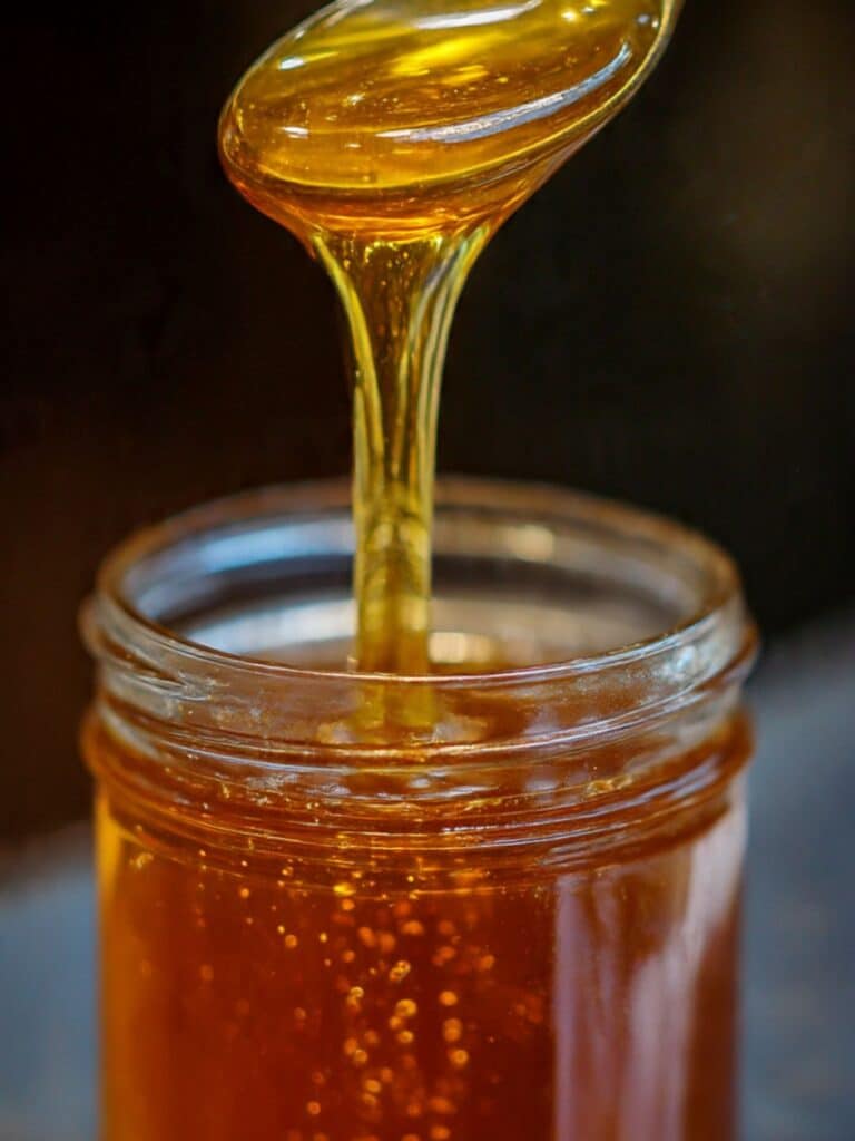 Canaan honey trick drink in a glass cup for weight loss