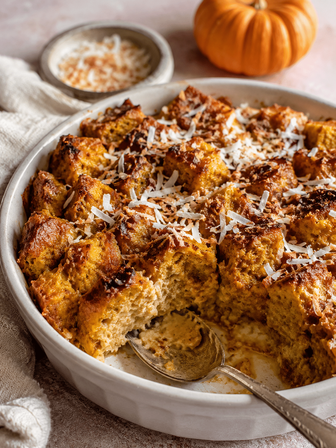 Gluten Free Coconut Pumpkin Bread Pudding for Cozy Fall Baking 1 Gluten Free Coconut Pumpkin Bread Pudding baked golden in a ceramic dish